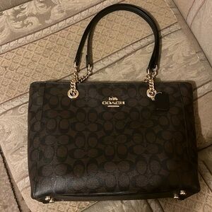 Coach brown / black hand bag